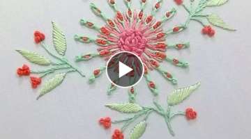 Hand embroidery pattern of a flower with cable chain stitch and french knots