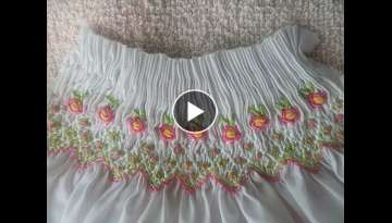 Smocking embroidery with Roses using Bullion stitch on the chest of a dress